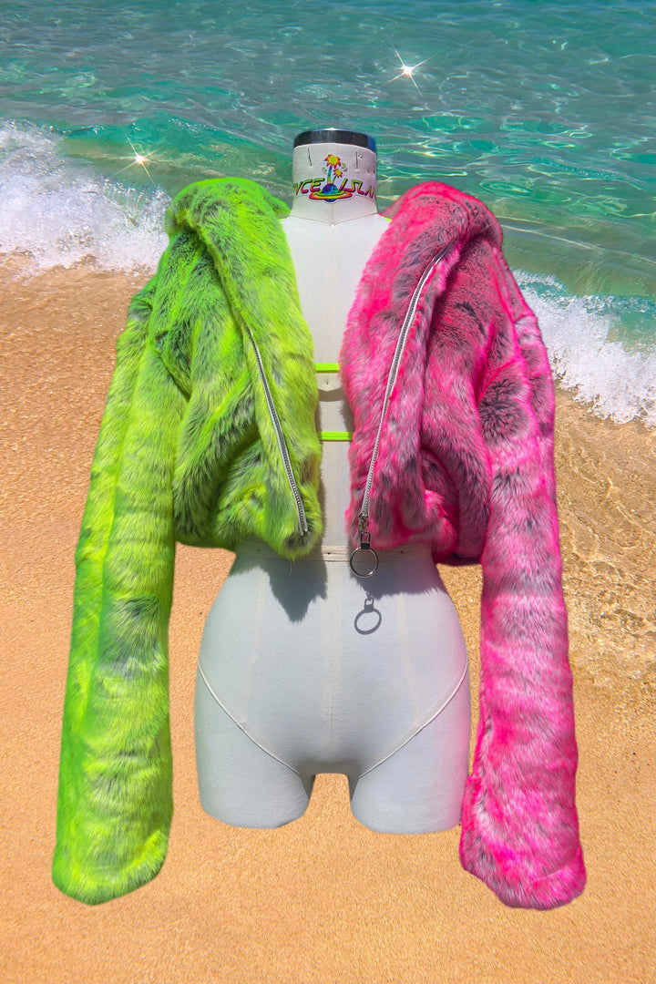 Colorful neon pink and green cropped faux fur coat with hood by Space Island.  Spvce Island is a wearable art collective featuring festival fashion, rave wear, club wear and streetwear. Buy coats, jackets, platform boots, gogo boots, rainbow platform sneakers, holographic sandals, shoes, burning man goggles, crystal chokers, holographic corsets, joggers, rave bottoms, bikinis, harnesses, bondage and more. 